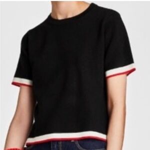 Zara like new knit black with white and red stripe trim sweater in a large.